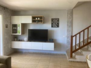 TV a/nebo společenská místnost v ubytování Chalet Ocean