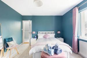 Katil atau katil-katil dalam bilik di Station Road Homestay