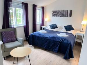 Postel nebo postele na pokoji v ubytování Verkshotellet Jørpeland