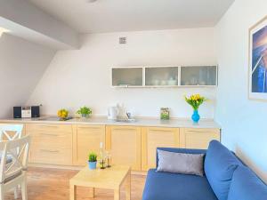Posezení v ubytování Apartament Węgorzewo przy porcie