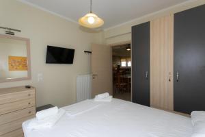 Postel nebo postele na pokoji v ubytování Canary Studios