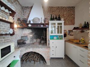 Kuchyň nebo kuchyňský kout v ubytování Apartments Lena