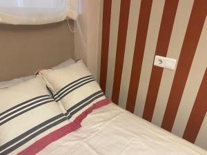 Postel nebo postele na pokoji v ubytování Bonito Apartamento con wifi y patio