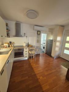 Kuchyň nebo kuchyňský kout v ubytování Holiday Home Marija