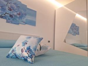 Ένα ή περισσότερα κρεβάτια σε δωμάτιο στο Grazia's Home