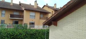 a row of houses with balconies on them at Precioso duplex en Moncalvillo Green Golf in Sojuela