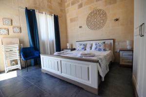 Voodi või voodid majutusasutuse The Cloisters Bed And Breakfast toas