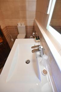 Vannituba majutusasutuses The Cloisters Bed And Breakfast