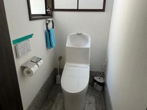 Een badkamer bij Marina Bay Atami