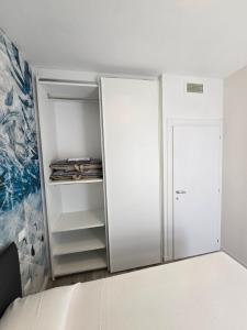 Postel nebo postele na pokoji v ubytování Home23Jesolo! Beach, Parking and Bikes included