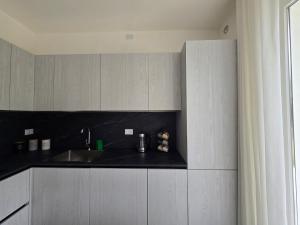 Kuchyň nebo kuchyňský kout v ubytování Home23Jesolo! Beach, Parking and Bikes included