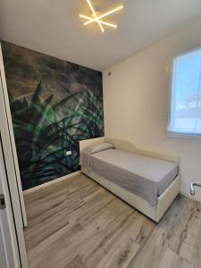 Postel nebo postele na pokoji v ubytování Home23Jesolo! Beach, Parking and Bikes included