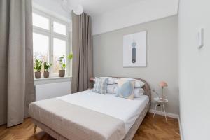 Posteľ alebo postele v izbe v ubytovaní 2 - bedroom Apartment with balcony - Rejtana 10