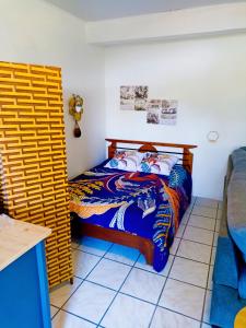 Postel nebo postele na pokoji v ubytování Chez Thierry et Alexandra
