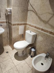 Et badeværelse på Umi Apartments