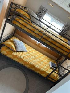 an overhead view of a bunk bed in a room at Disabled 4 Berth in Ingoldmells