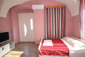 Ένα ή περισσότερα κρεβάτια σε δωμάτιο στο Studio apartman Maro