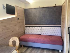 Postel nebo postele na pokoji v ubytování Berg Hotel Latemar Spitze
