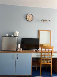 a desk with a computer on top of it at Sole Mar in Sunny Beach