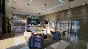 Et opholdsområde på Comfort Hotel Taguatinga - Flat Encantador c/ Wifi