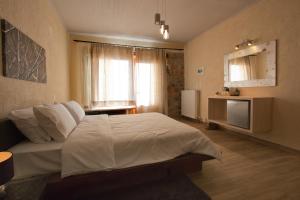 Fotografia z galérie ubytovania Livadi Suites v destinácii Arachova