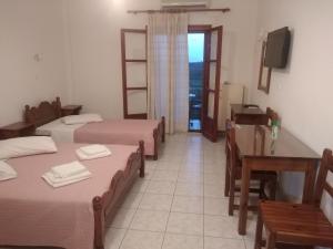 Postel nebo postele na pokoji v ubytování Apollonio Nikopolis