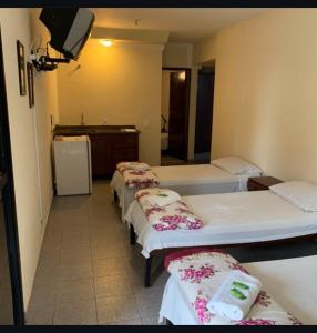 Vuode tai vuoteita majoituspaikassa Scala Residence Hotel