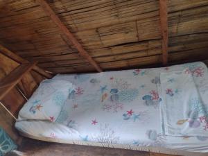 Voodi või voodid majutusasutuse Wira Pora Hostal toas