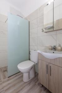 Koupelna v ubytování Alamia Suites