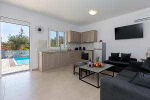 Kuchyň nebo kuchyňský kout v ubytování Alamia Suites