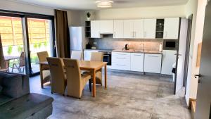 Kuchyň nebo kuchyňský kout v ubytování Apartmánové domy Lipno 1