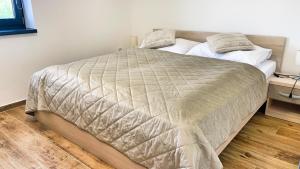 Postel nebo postele na pokoji v ubytování Apartmánové domy Lipno 1