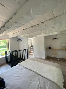 Postel nebo postele na pokoji v ubytování La Maison Armoricaine