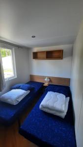 Postel nebo postele na pokoji v ubytování Chalet Aventura 1-6 pers- 3 slaapk- 2 badk- Berging- Inchecken al vanaf 13 uur