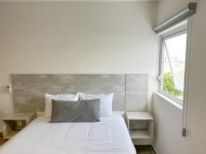 Postel nebo postele na pokoji v ubytování SR Hotel