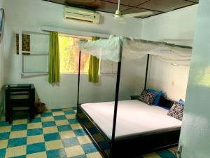 Postel nebo postele na pokoji v ubytování Villa Bobo