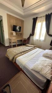 Postel nebo postele na pokoji v ubytování Isly Golf Hotel