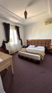 Postel nebo postele na pokoji v ubytování Isly Golf Hotel