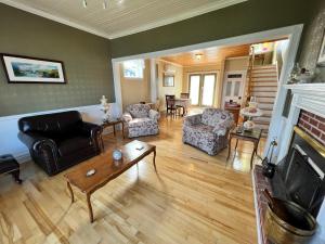 a living room filled with furniture and a fireplace at Kelly's Landing in Trinity