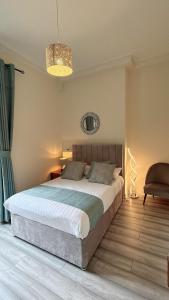 Postel nebo postele na pokoji v ubytování newington accommodation