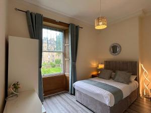 Postel nebo postele na pokoji v ubytování newington accommodation