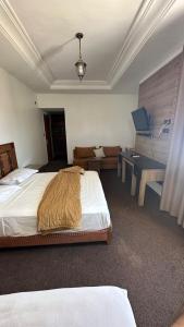 Postel nebo postele na pokoji v ubytování Isly Golf Hotel