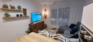 Μια τηλεόραση ή/και κέντρο ψυχαγωγίας στο Vistas al Mediterraneo by ASH