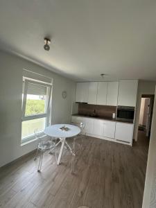 Kuchyň nebo kuchyňský kout v ubytování Ruby's Home