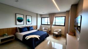 Una cama o camas en una habitación de Flat de Luxo com Quarto Privativo 22º Andar no Vertigo 16 fotos más