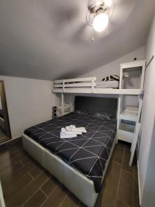 Posteľ alebo postele v izbe v ubytovaní Studio apartman Diklo + 14 fotografií