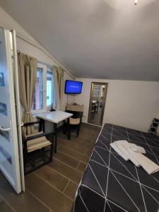 Posteľ alebo postele v izbe v ubytovaní Studio apartman Diklo