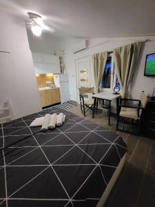 Posteľ alebo postele v izbe v ubytovaní Studio apartman Diklo