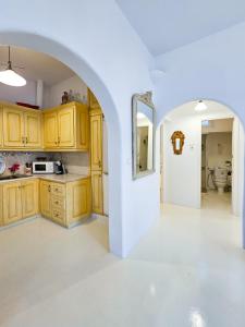 Η κουζίνα ή μικρή κουζίνα στο Nikis Home Town