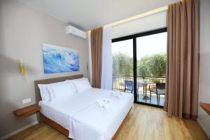 Postel nebo postele na pokoji v ubytování Mezzanine Bay